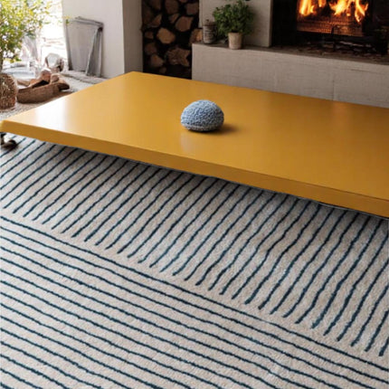 Hand Tufted Wool Rug: Minimalist Blue Stripe Pattern