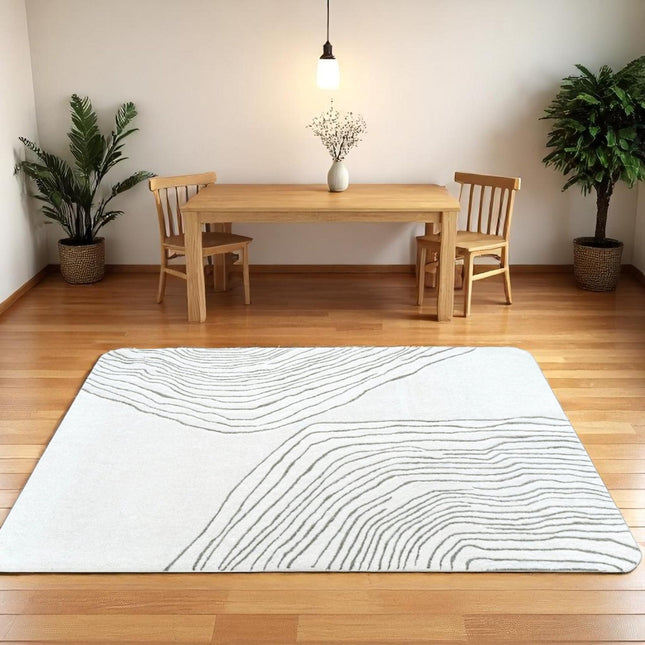 Hand Tufted Wool Abstract Waves Rug: Modern Ivory Area Rug