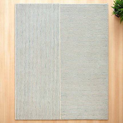 Hand Tufted Wool Rug: Minimalist Blue Stripe Pattern