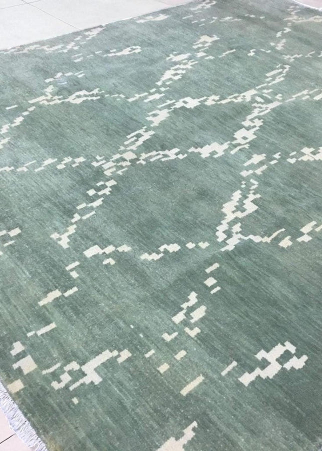 Hand Knotted Ikat Wool Rug: Soft Green & Beige Modern Carpet