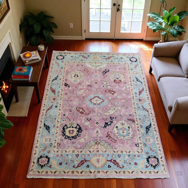 Hand-Knotted Oushak Wool Rug: Pink Turkish Floral Area Rug