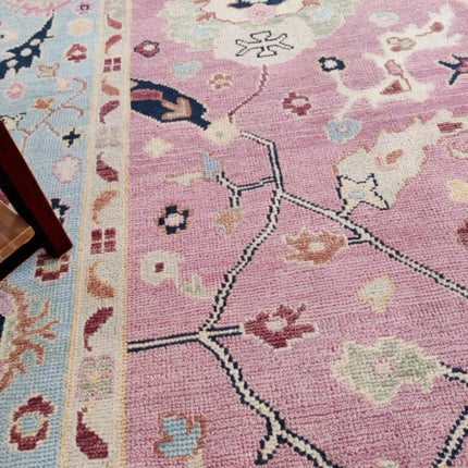 Hand-Knotted Oushak Wool Rug: Pink Turkish Floral Area Rug