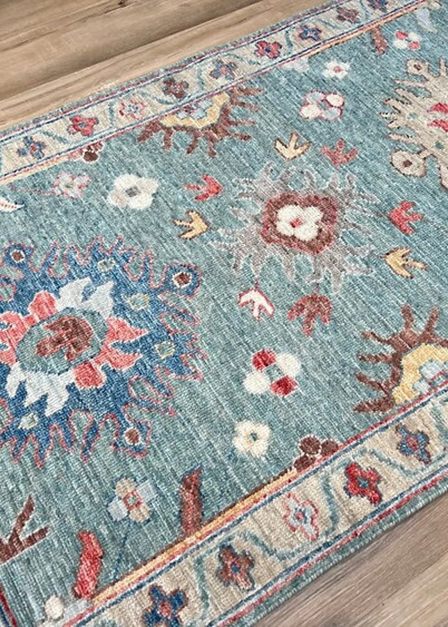 Turquoise Floral 8x10 Oushak Rug: A Handwoven Turkish Carpet