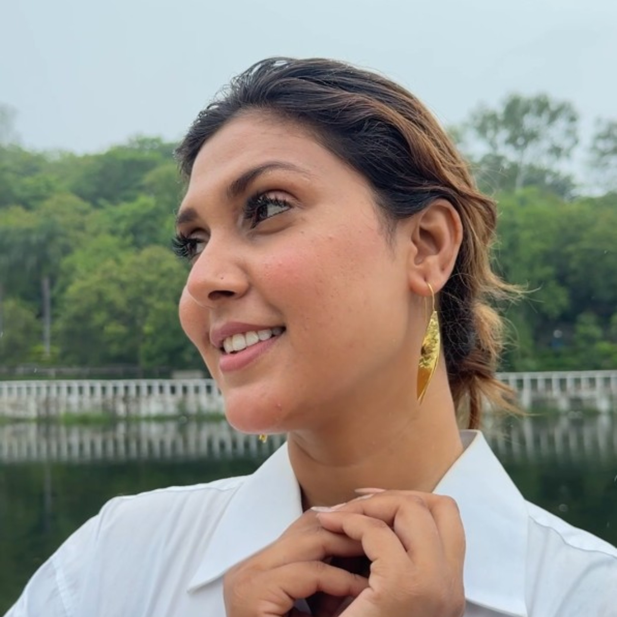 Luminous Curve Golden Hammered Brass Drop Earrings - Image 2